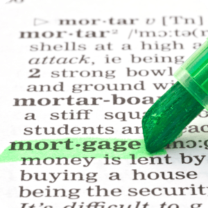 Paper with the word mortgage highlighted in green.