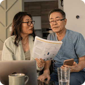 Older couple looking at finances together.
