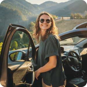 Women getting out of her car in the hills