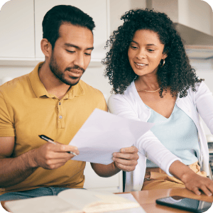 A couple looking over financials determined.