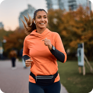 Woman smiling while jogging.