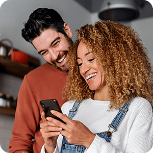 Couple looking at a smart phone