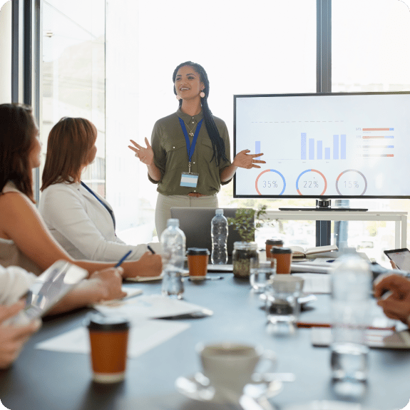 People watching an annual meeting presentation.