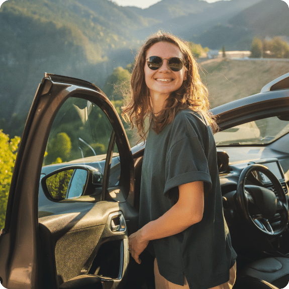 Woman getting out of her car