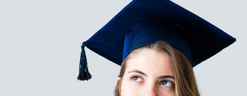 Girl wearing graduation cap.