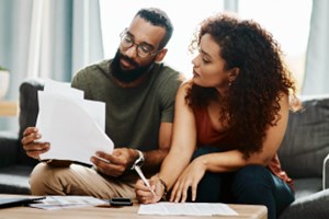 Couple reviewing bills